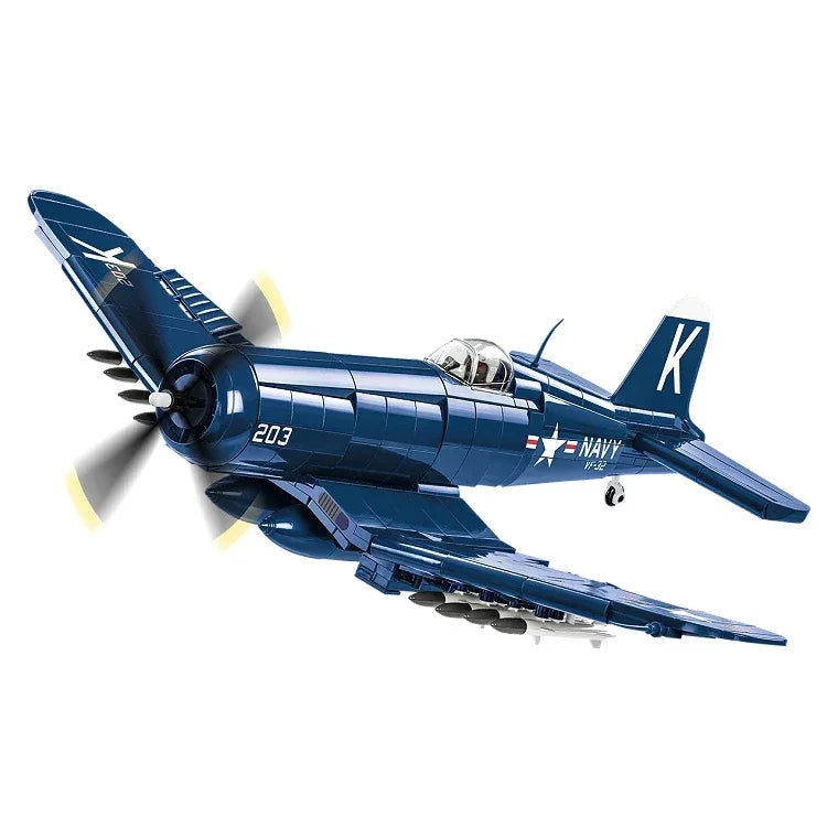 Dunkelblaues Spielzeugflugzeug mit Propeller und US Navy-Markierungen