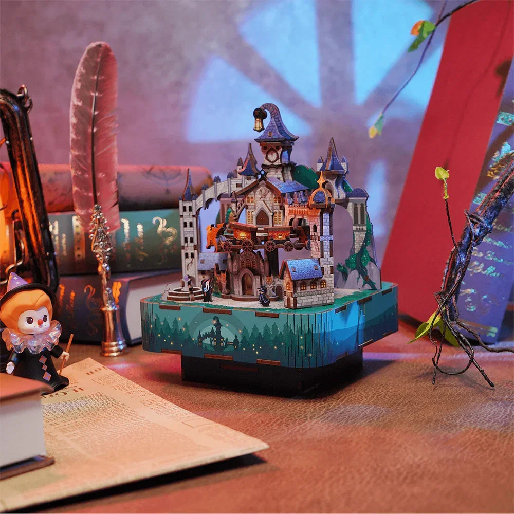 Miniatur-Zauberschloss-Diorama mit Büchern und Federkiel