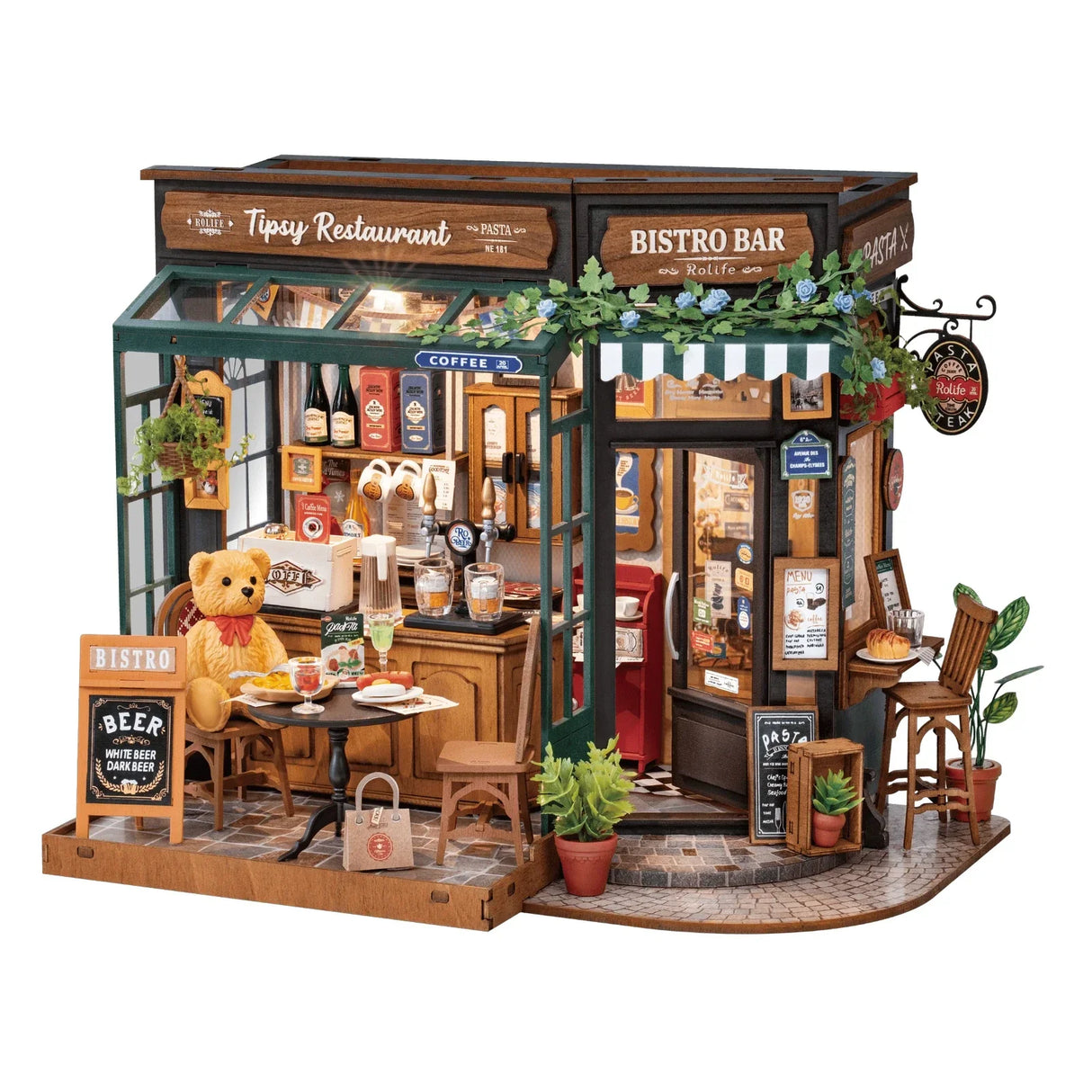 Miniatur-Restaurant mit Teddybär am Tisch, Bierhähnen und Menütafeln