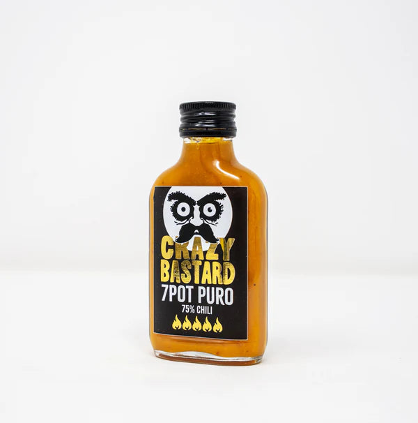 7 Pot Puro Chilisauce von Crazy Bastard Sauce, 100ml Flasche mit schwarzem Etikett und Totenkopf-Logo, 75% Chili, 5 Flammen Schärfegrad