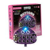 CircuitMess Wacky Robots Buttons STEM Bausatz mit lila Platine und Tasten vor der pinken Verpackung