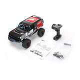 MJX Hyper Go H12P 1:12 RC Climbing Car Lieferumfang mit Fernsteuerung, Anleitung und Zubehör auf weißem Hintergrund.